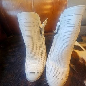 Sugar cream colored heeled buckle booties